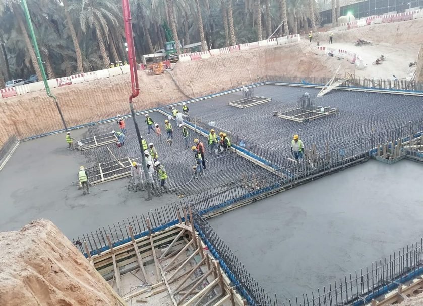 Site team pouring reinforced concrete